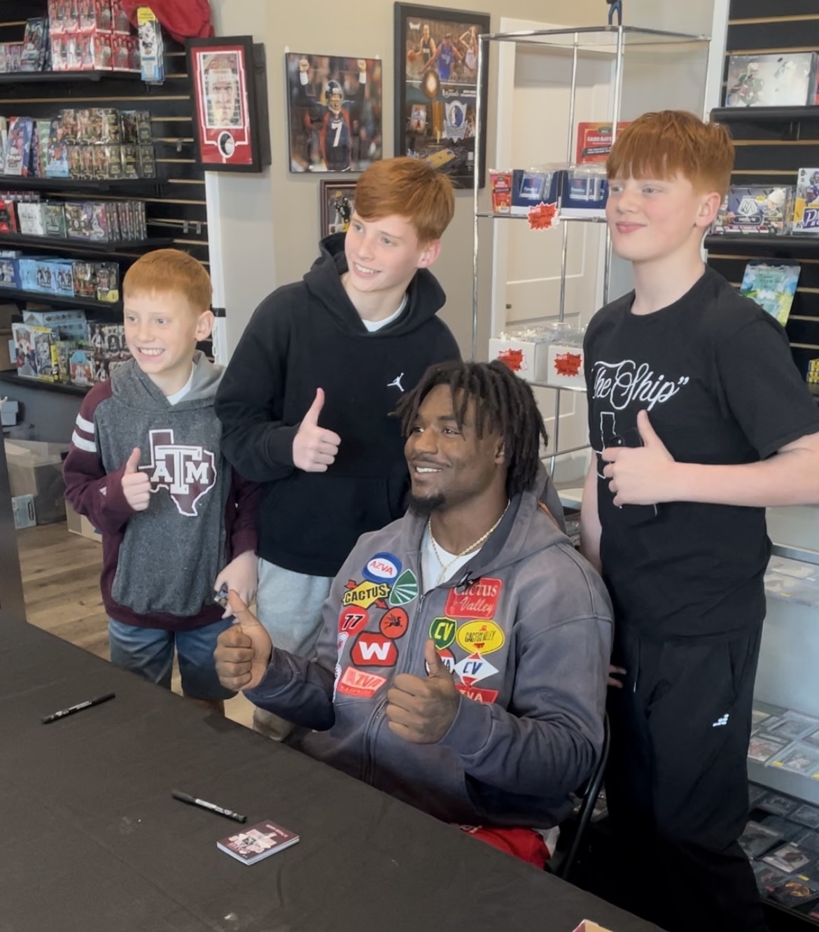 Young fans meeting an athlete at a trading card event